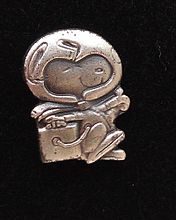 NASA Silver Snoopy award, sterling silver lapel pin (tie tac), flown aboard Space Shuttle Discovery's STS-116 mission.